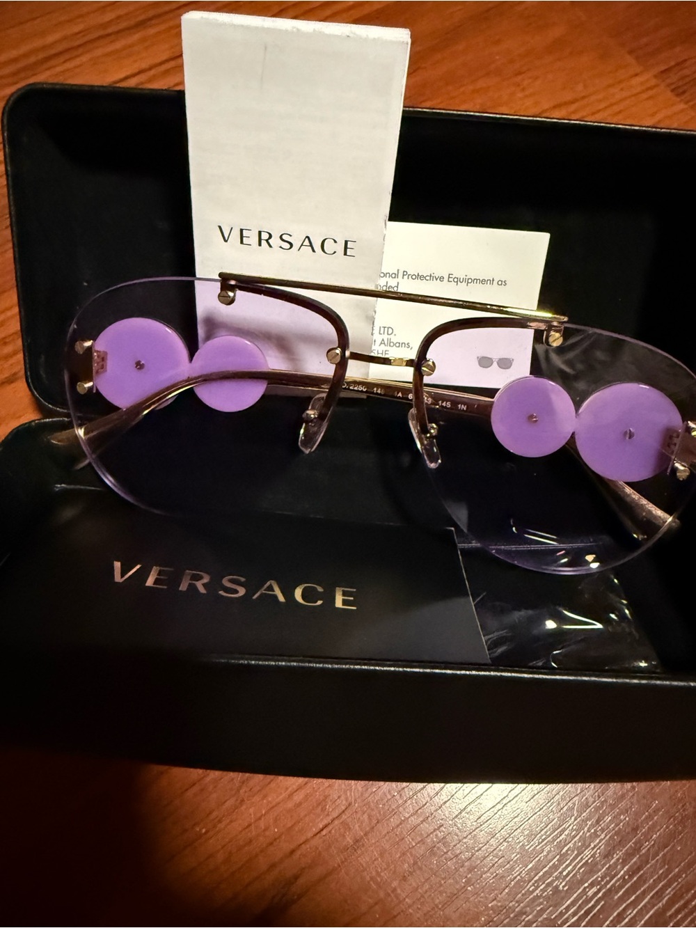 Versace Women Purple Rimless Sunglasses with Gold Frame Accents
